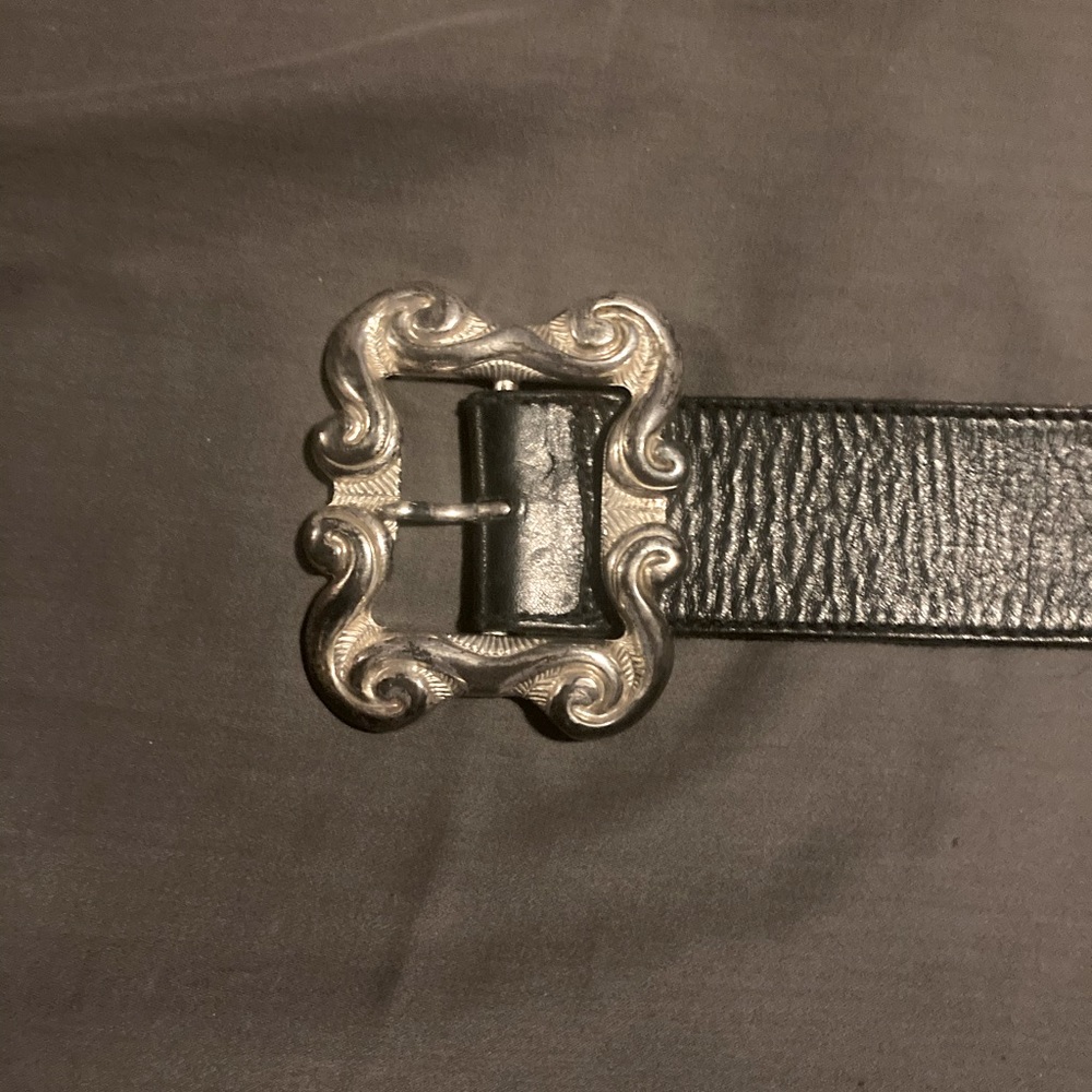 Vintage leather belt with beautiful silver buckle